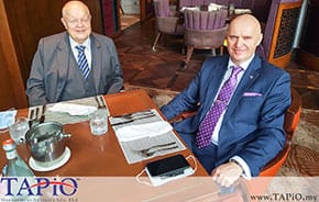 two diplomats sitting